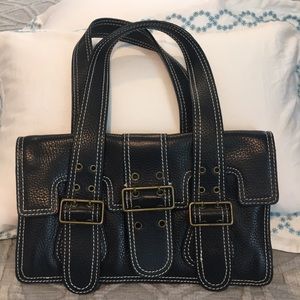 Woman’s black small bag